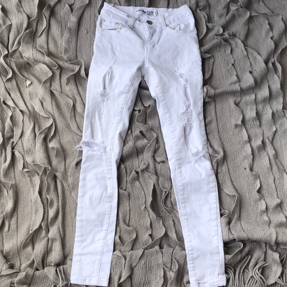Ripped white low rise jeans
